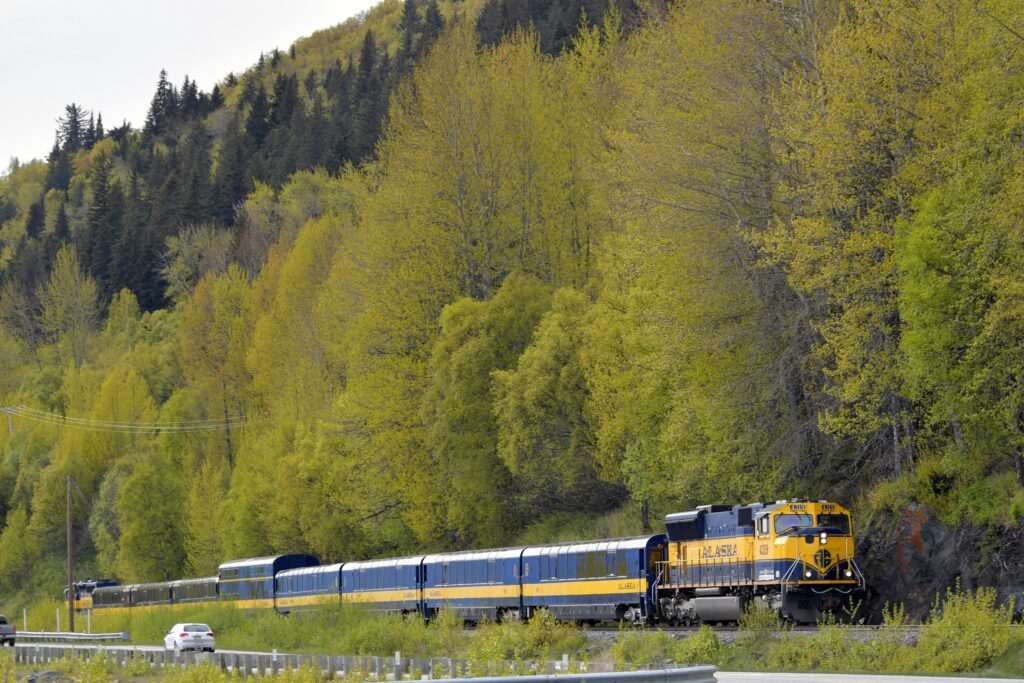 Alaska Railroad train traveling through Alaska wilderness near Anchorage