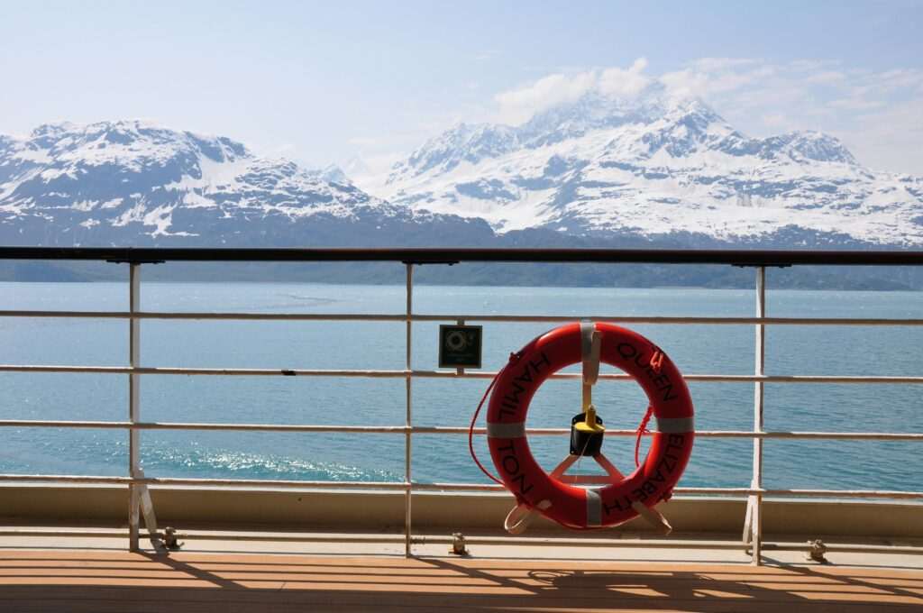 Cruise ship in Alaska with snowy mountains and icy water