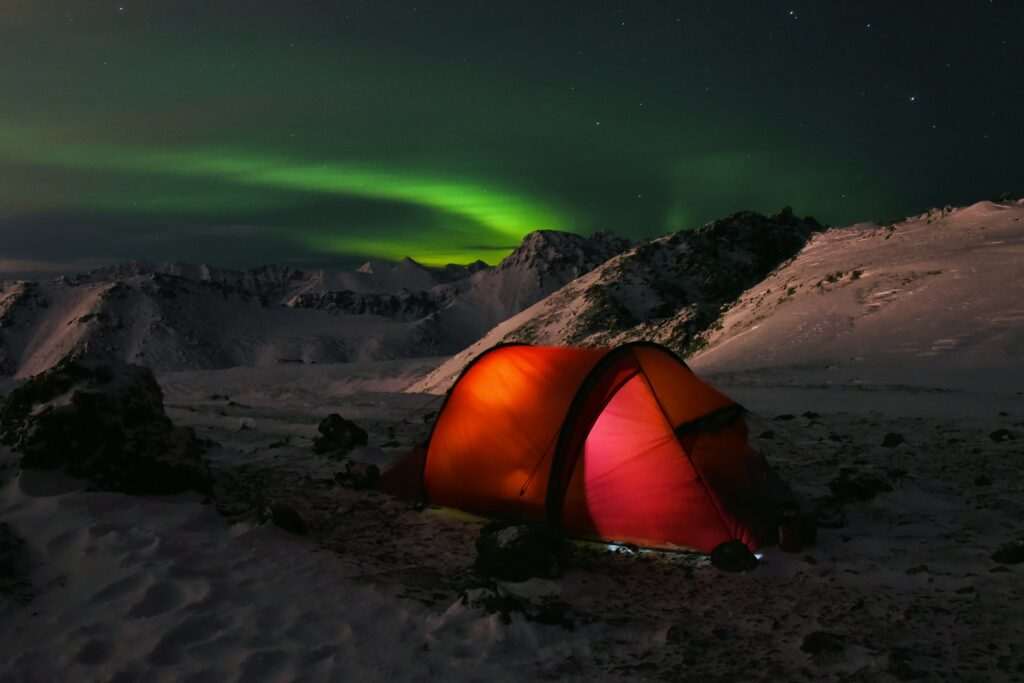 Anchorage city lights below the winter sky at night